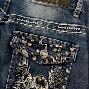 Sky jeans with white skull